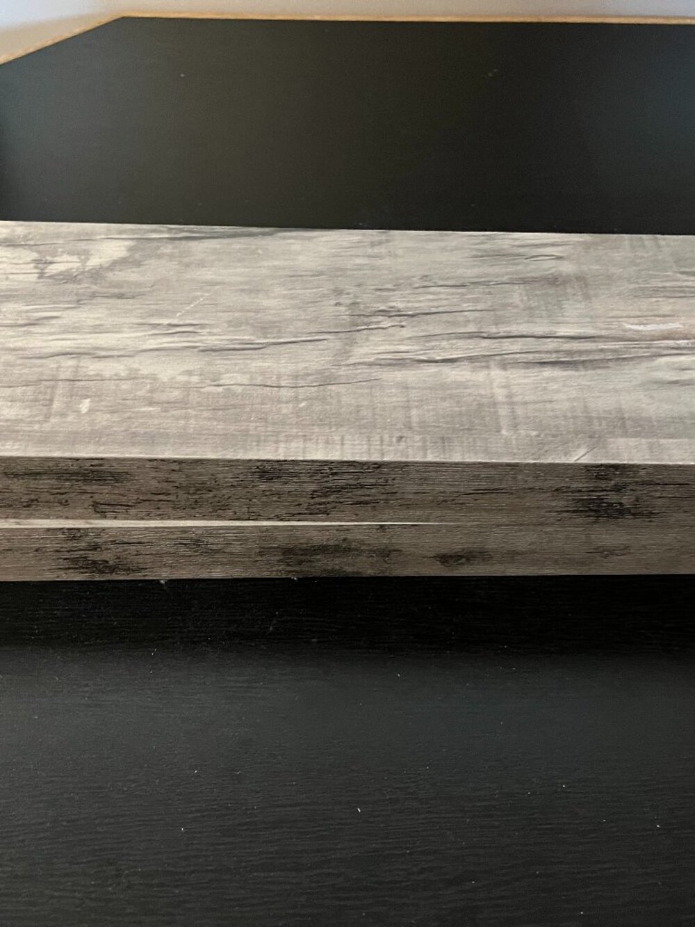 2 grey wood like floating shelves